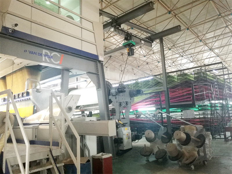 Foshan New Dream Carpet Co., Ltd. linea di produzione in fabbrica